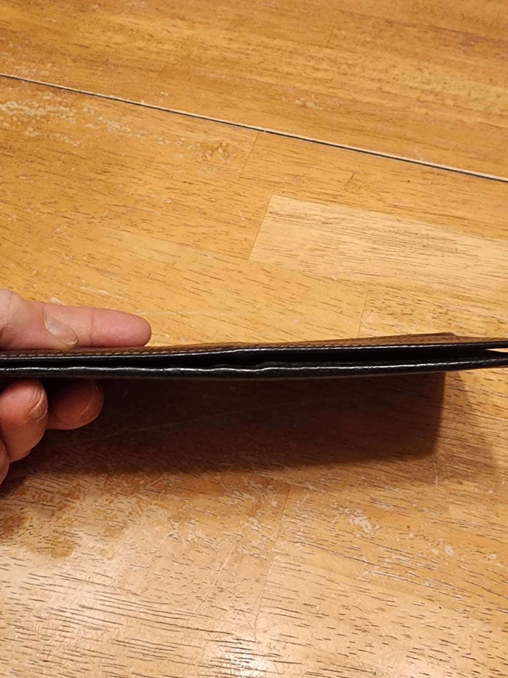 black leather Celine long wallet featuring an embossed Triomphe logo.  - Picture 7 of 16